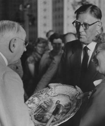 Mayor of Delft, Netherlands, Prof H.B. Dorgelo and his wife present Delft plate to Dr Buchman