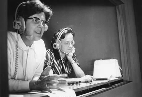 Two ladies in the interpretation booth in Caux